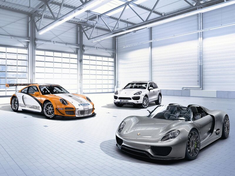 Porsche cars in a garage