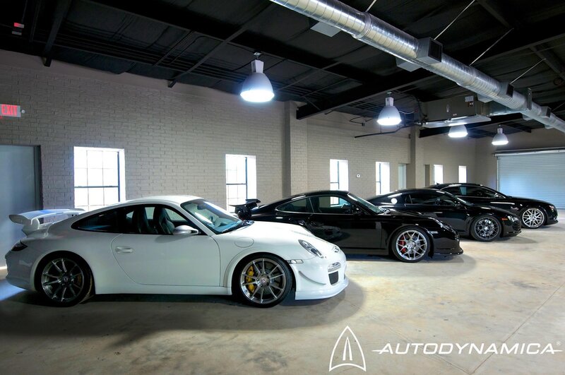 Porsche cars in a garage