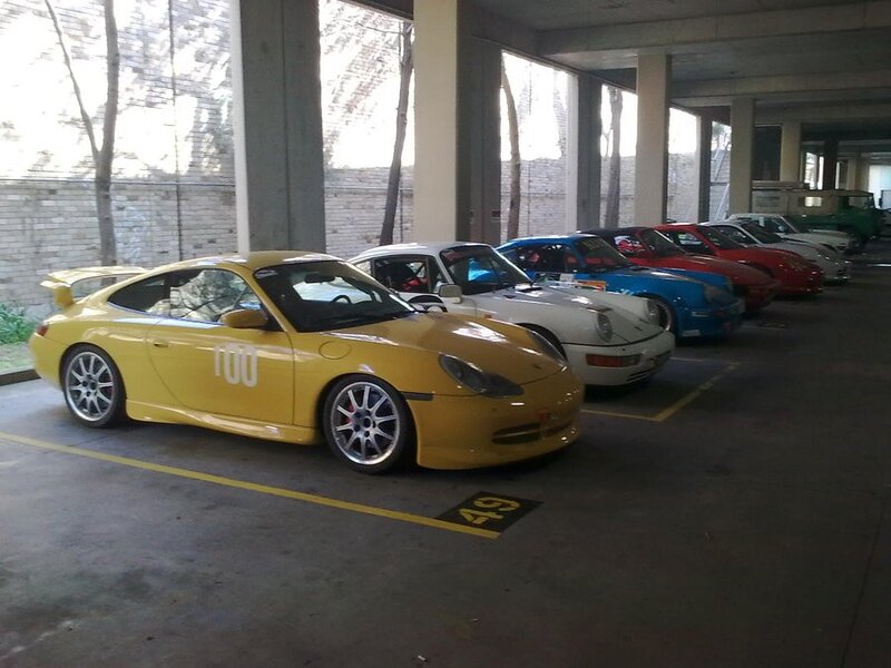 Porsche cars in parking garage