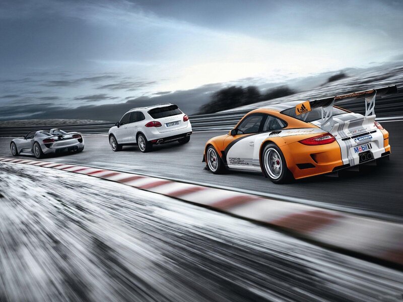 Porsche cars on a racetrack