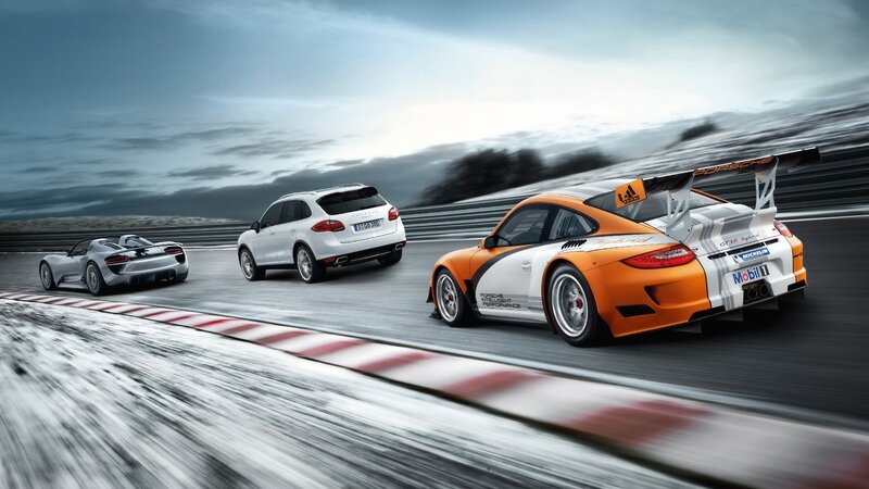 Porsche cars on a racetrack