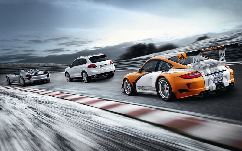 Porsche cars on a racetrack