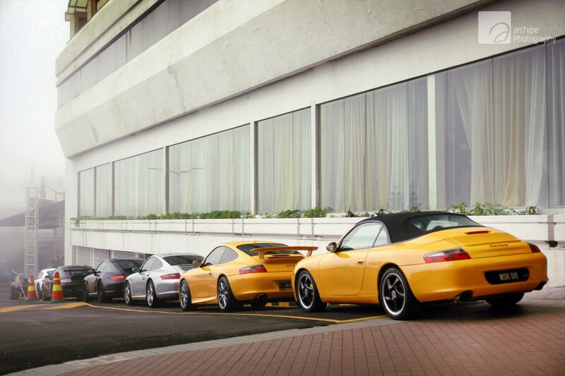 Porsche cars parked in a row