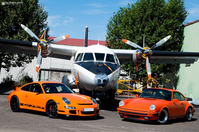 Porsche cars with a plane