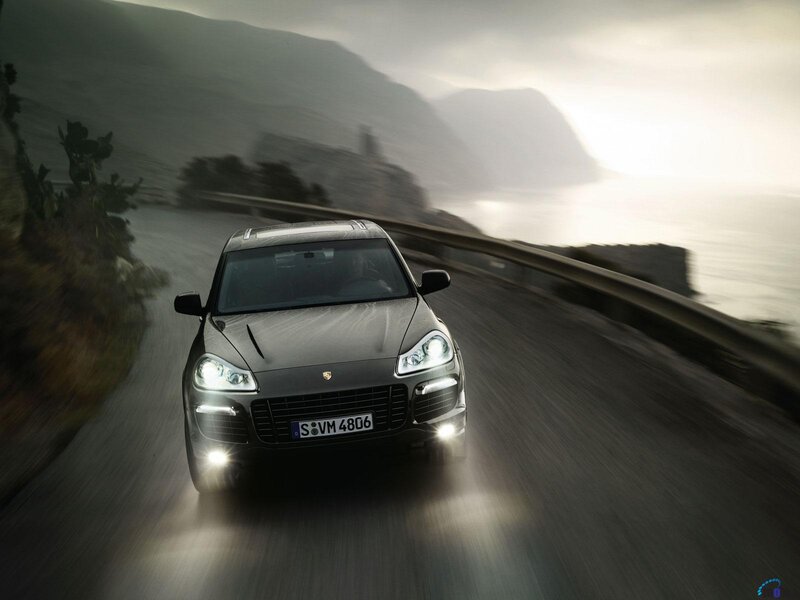 Porsche Cayenne on Coastal Road — Gray, Dramatic
