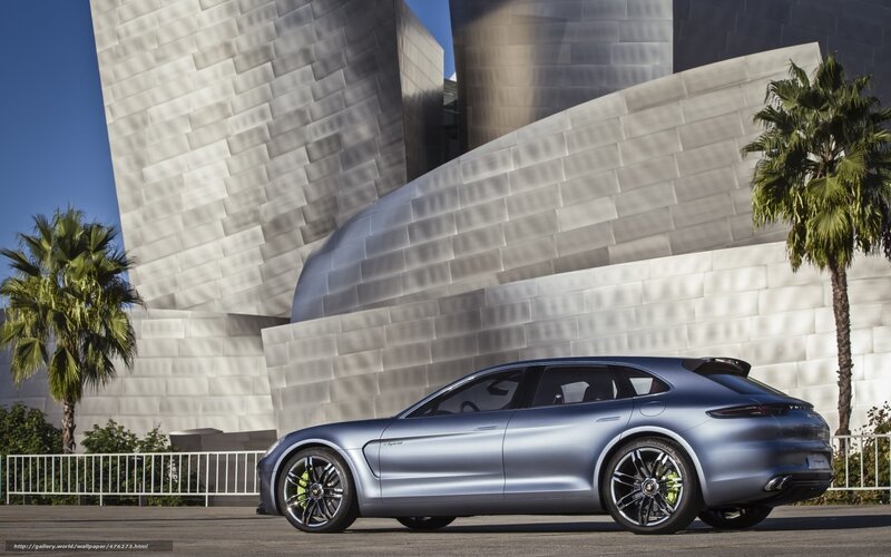 Porsche concept car in front of modern building