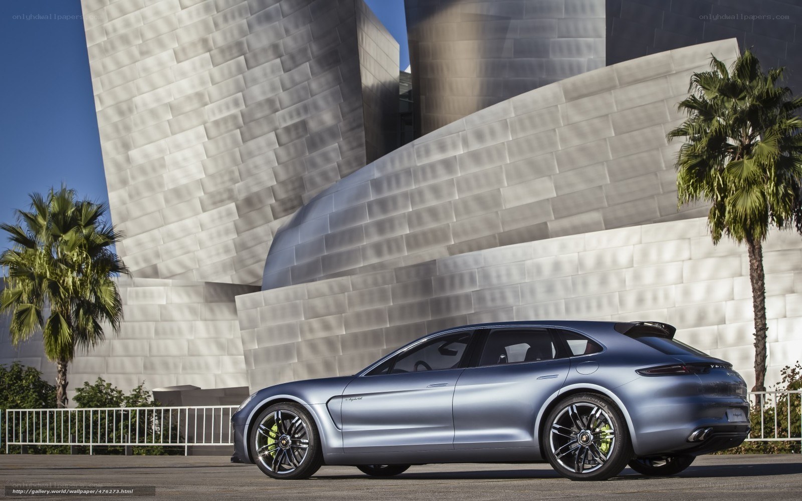 Porsche concept car in front of modern building