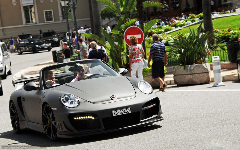 Porsche convertible on city street