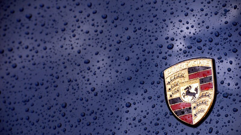 Porsche Emblem on Car — Blue