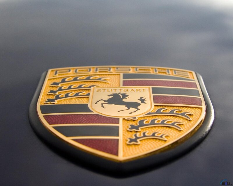 Porsche Emblem on Car — Gold