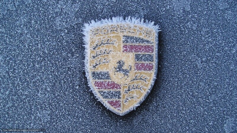 Porsche emblem on frosty surface