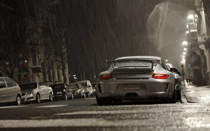 Porsche GT3 on a rainy street