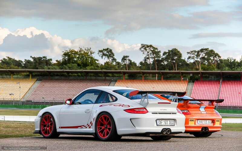Porsche GT3 RS cars at racetrack