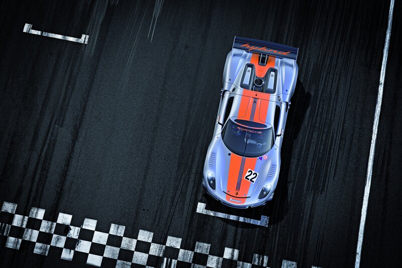 Porsche hybrid race car on track