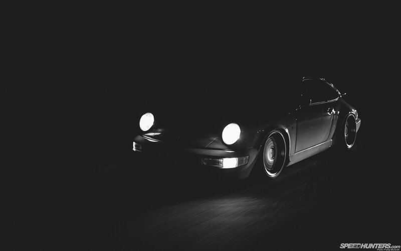 Porsche in dark studio