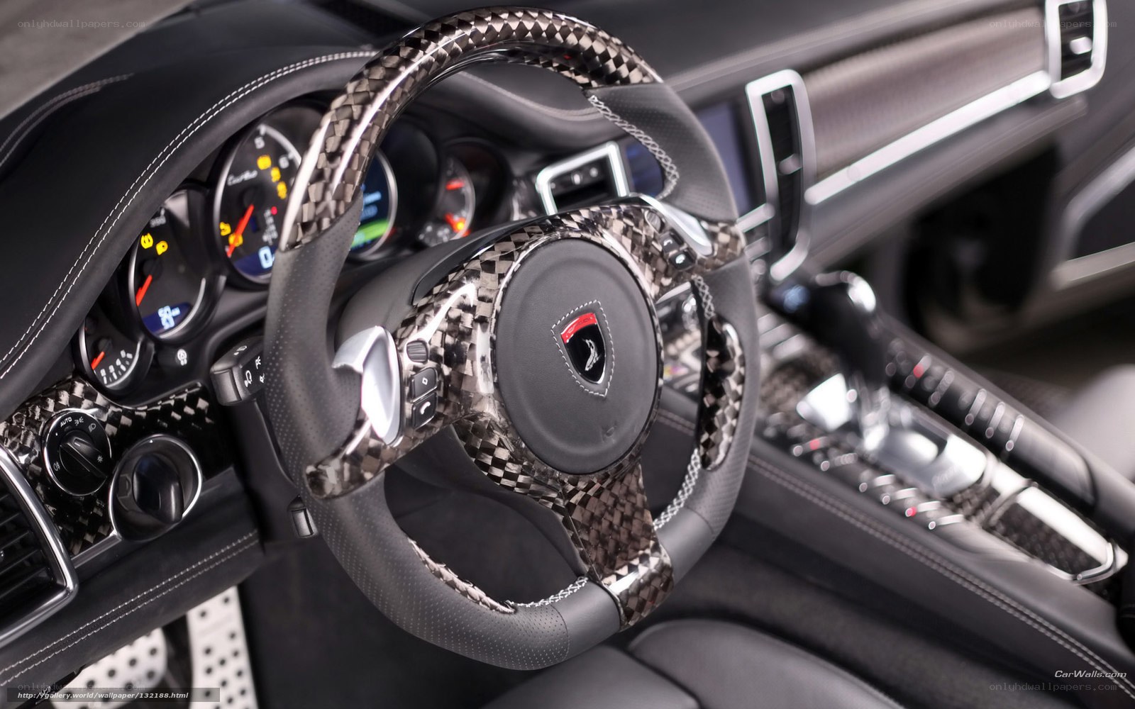 Porsche interior with carbon fiber steering wheel