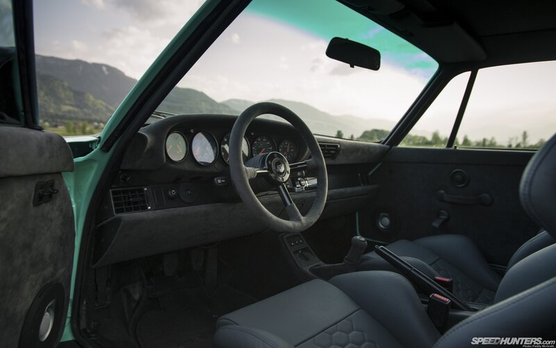 Porsche interior with mountain view