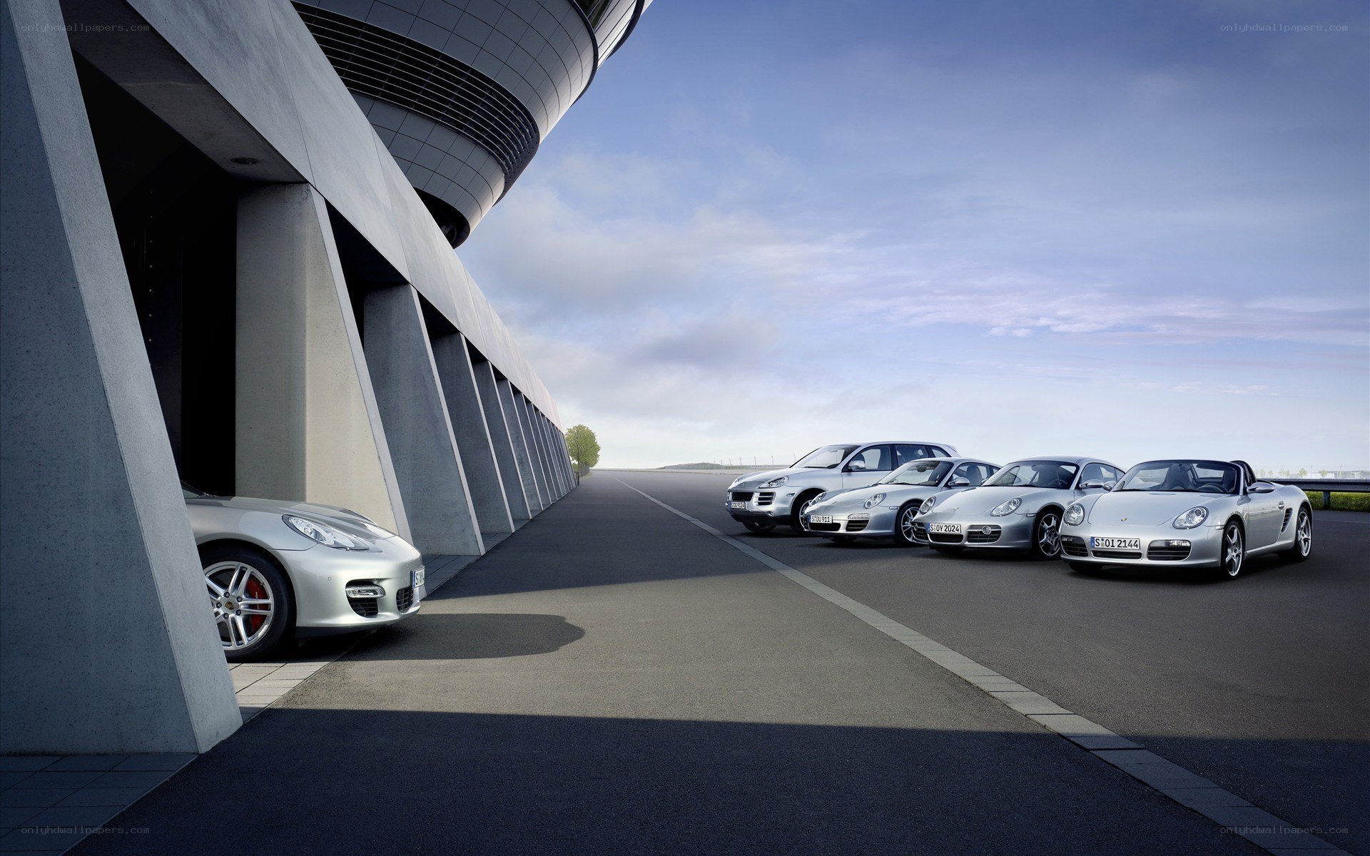Porsche lineup at racetrack