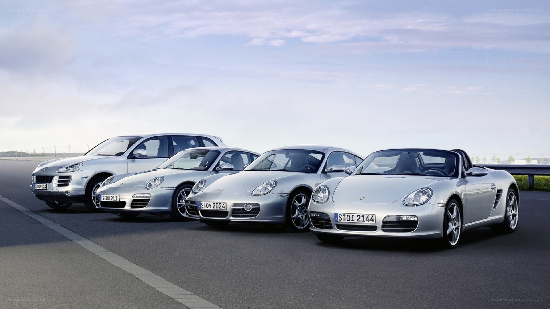 Porsche lineup on a racetrack