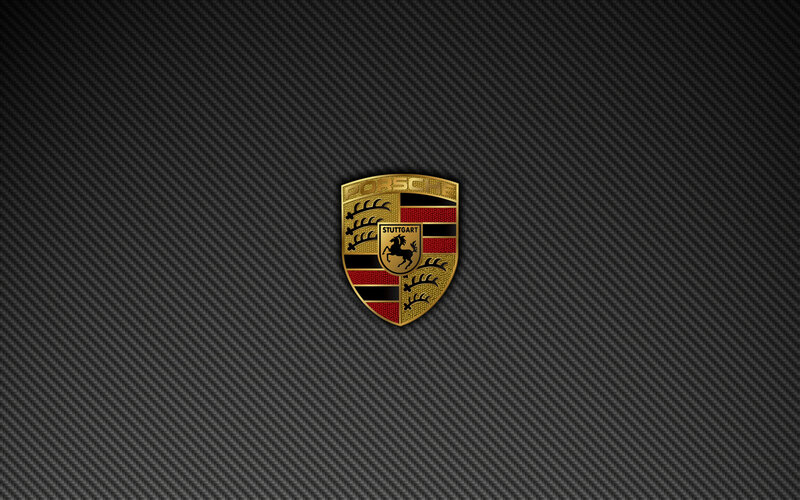 Porsche logo on carbon fiber