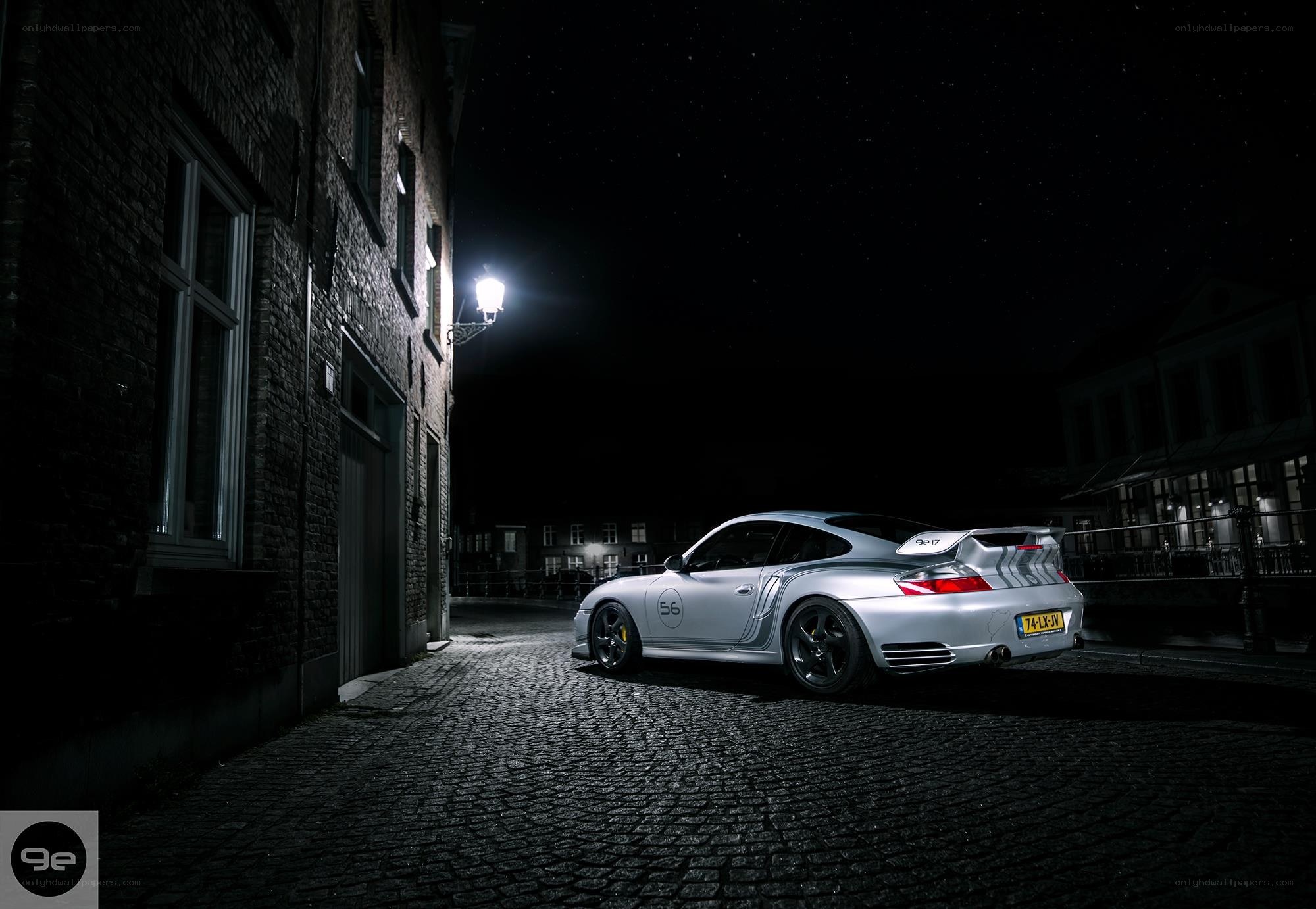 Porsche on a cobblestone street