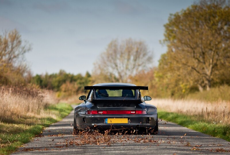 Porsche on a country road
