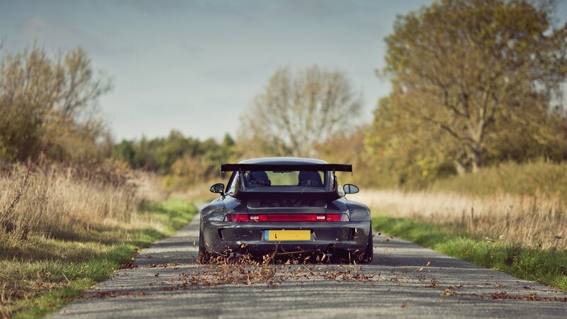 Porsche on a country road