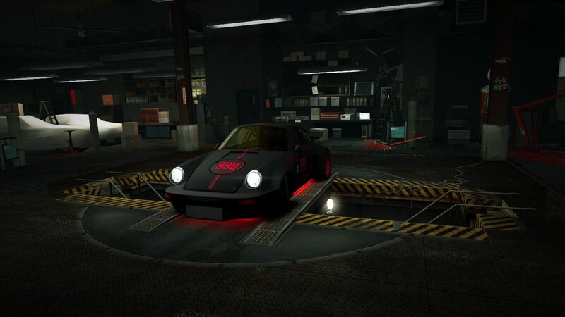 Porsche on a turntable in garage