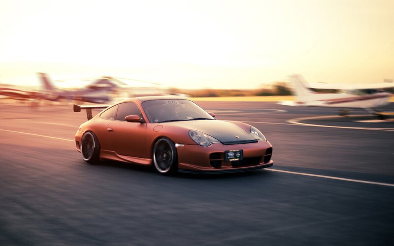 Porsche on an airport runway