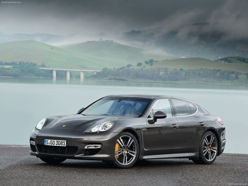Porsche Panamera on a lakeside road