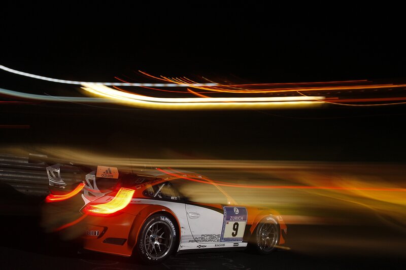 Porsche race car at night