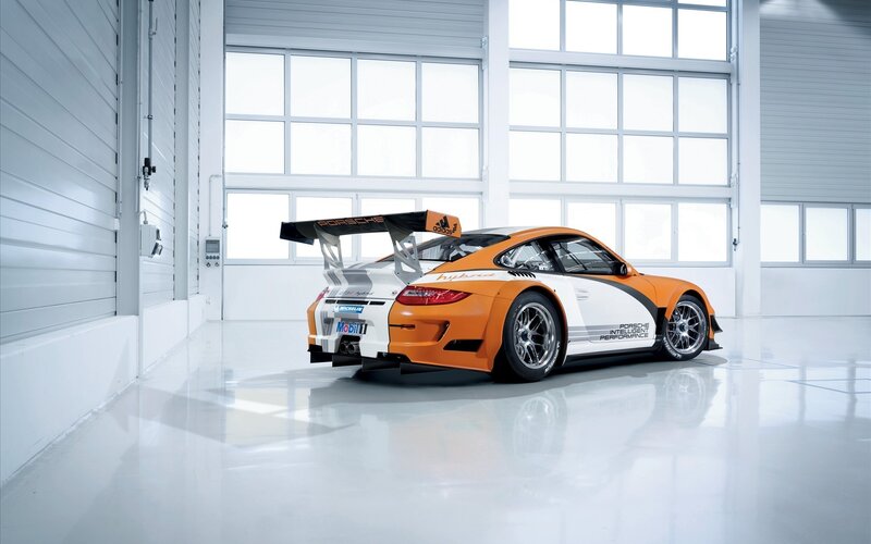 Porsche race car in garage