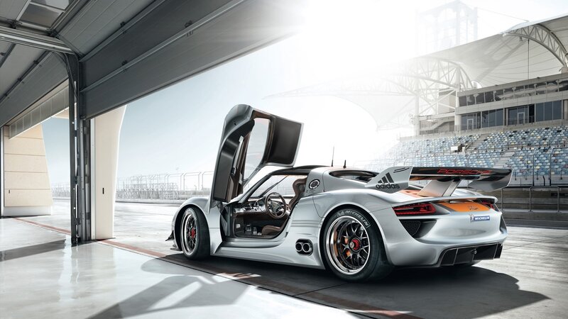 Porsche race car in garage