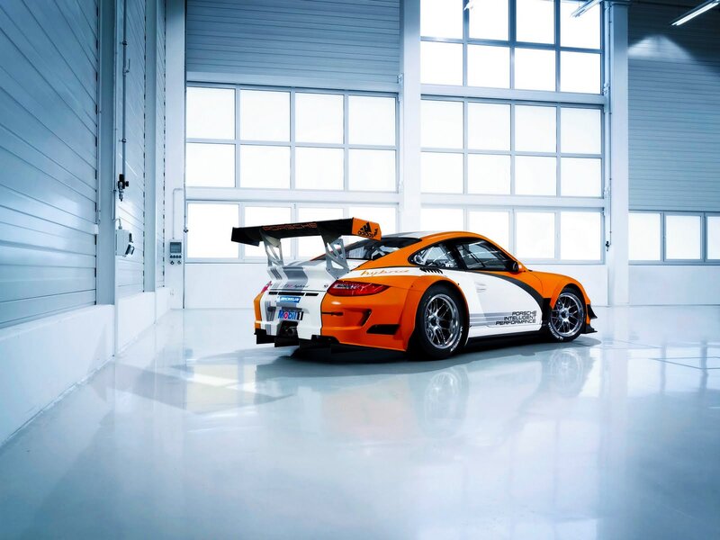 Porsche race car in garage