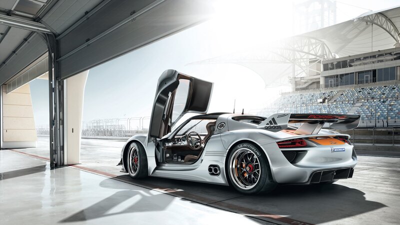 Porsche race car in garage