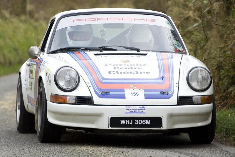 Porsche race car on road