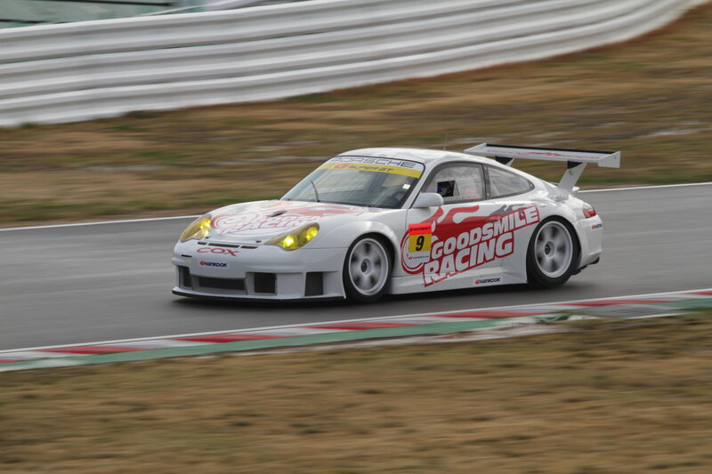 Porsche race car on track