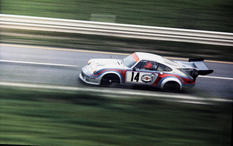 Porsche race car on track
