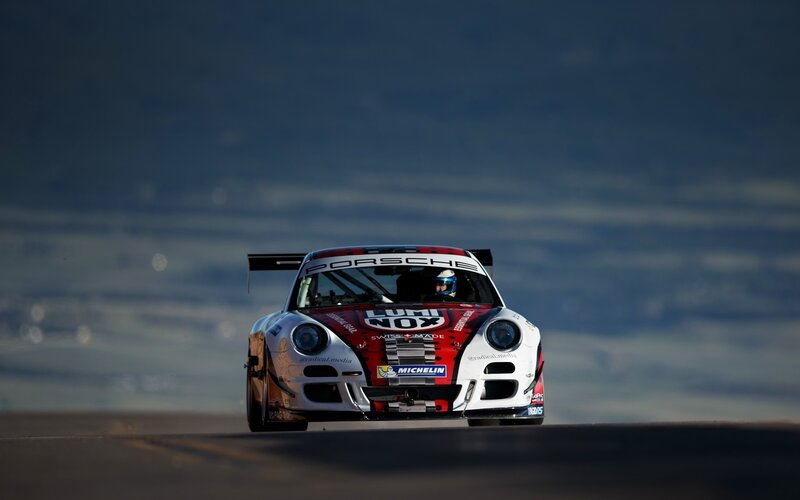 Porsche race car on track