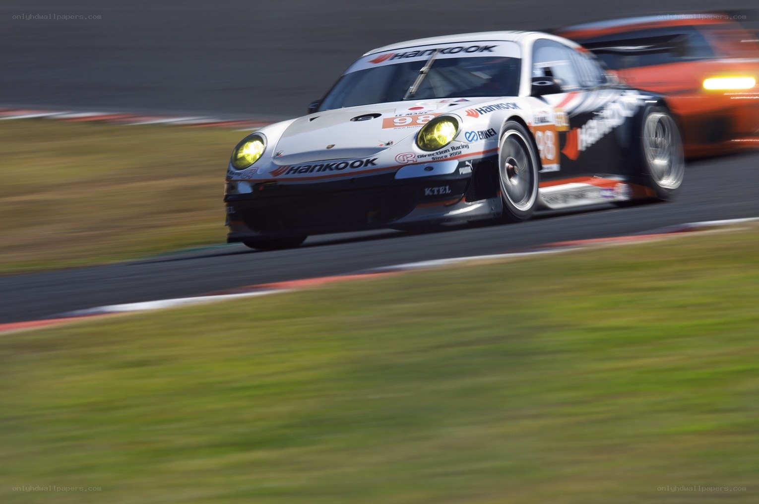 Porsche race car on track