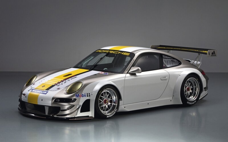 Porsche race car with sponsor decals