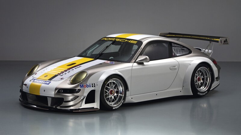 Porsche race car with sponsor decals