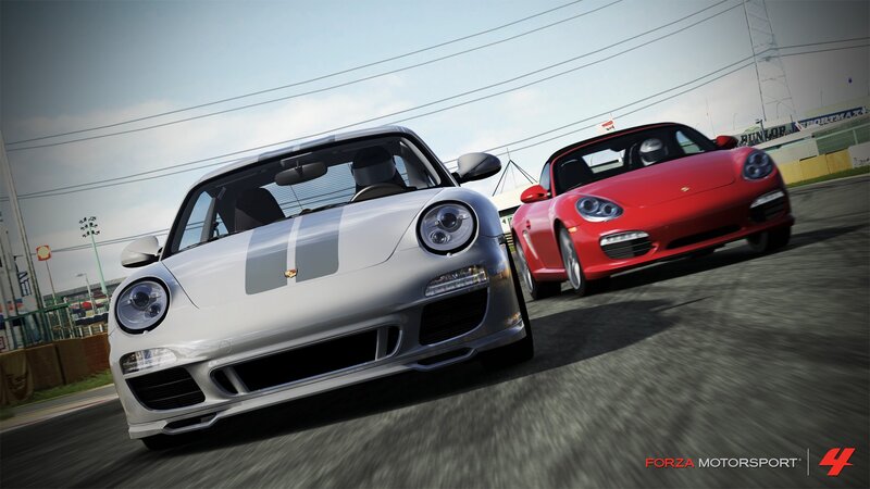 Porsche race cars on track