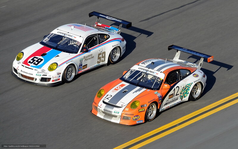 Porsche race cars on track