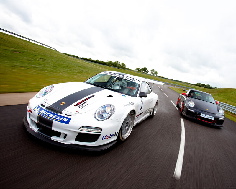 Porsche Race Cars on Track — White