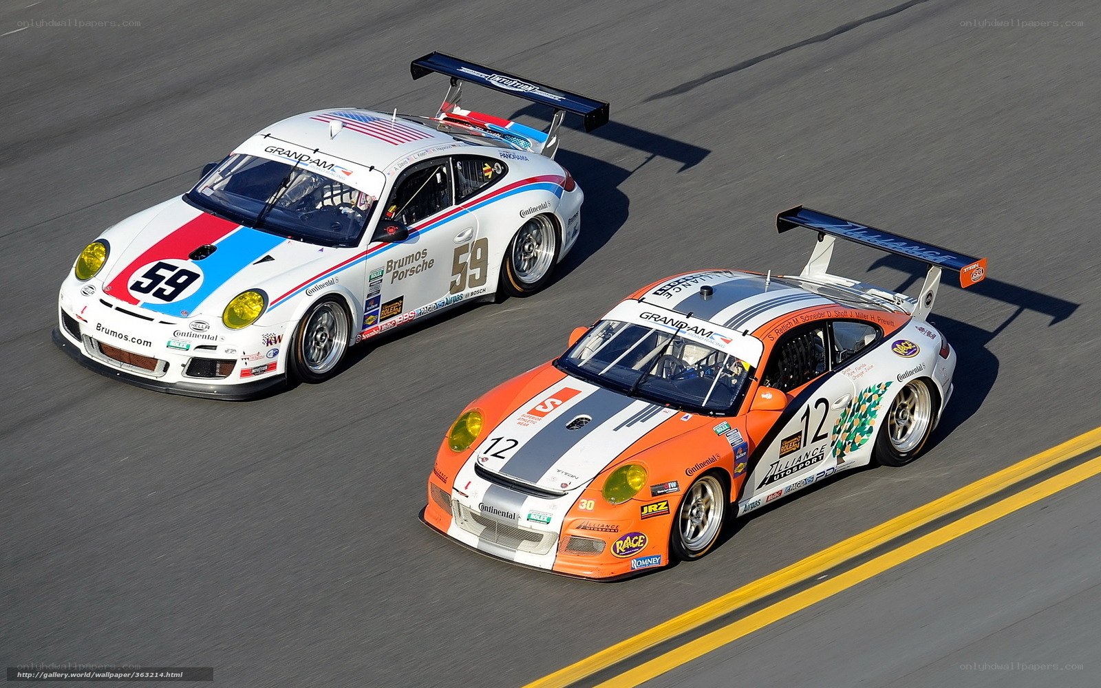 Porsche race cars on track