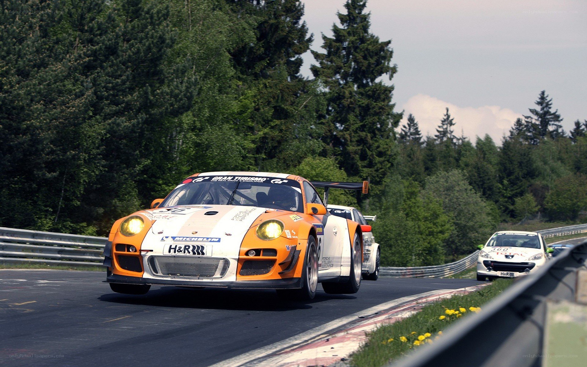 Porsche racing on a track