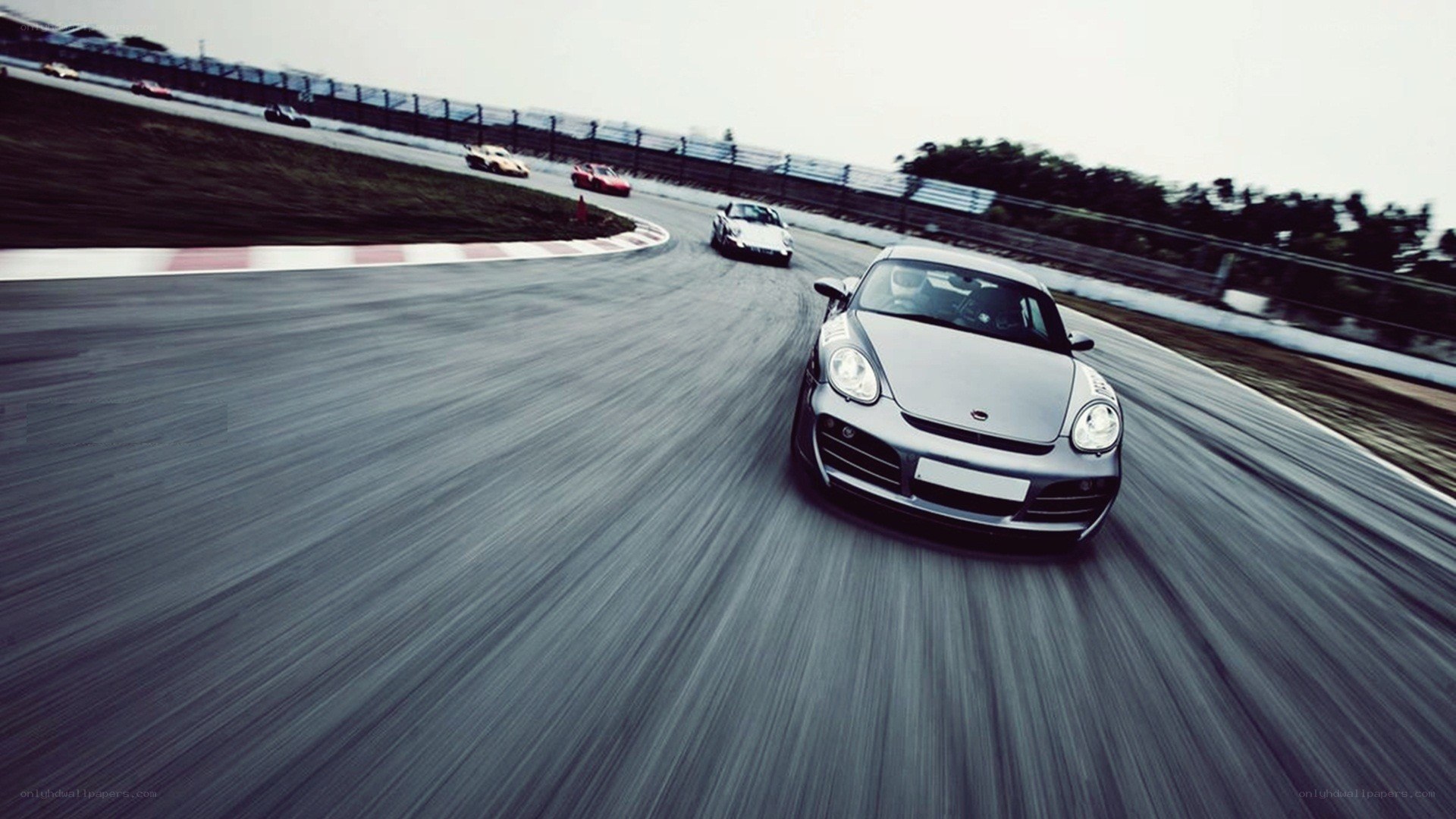 Porsche racing on a track
