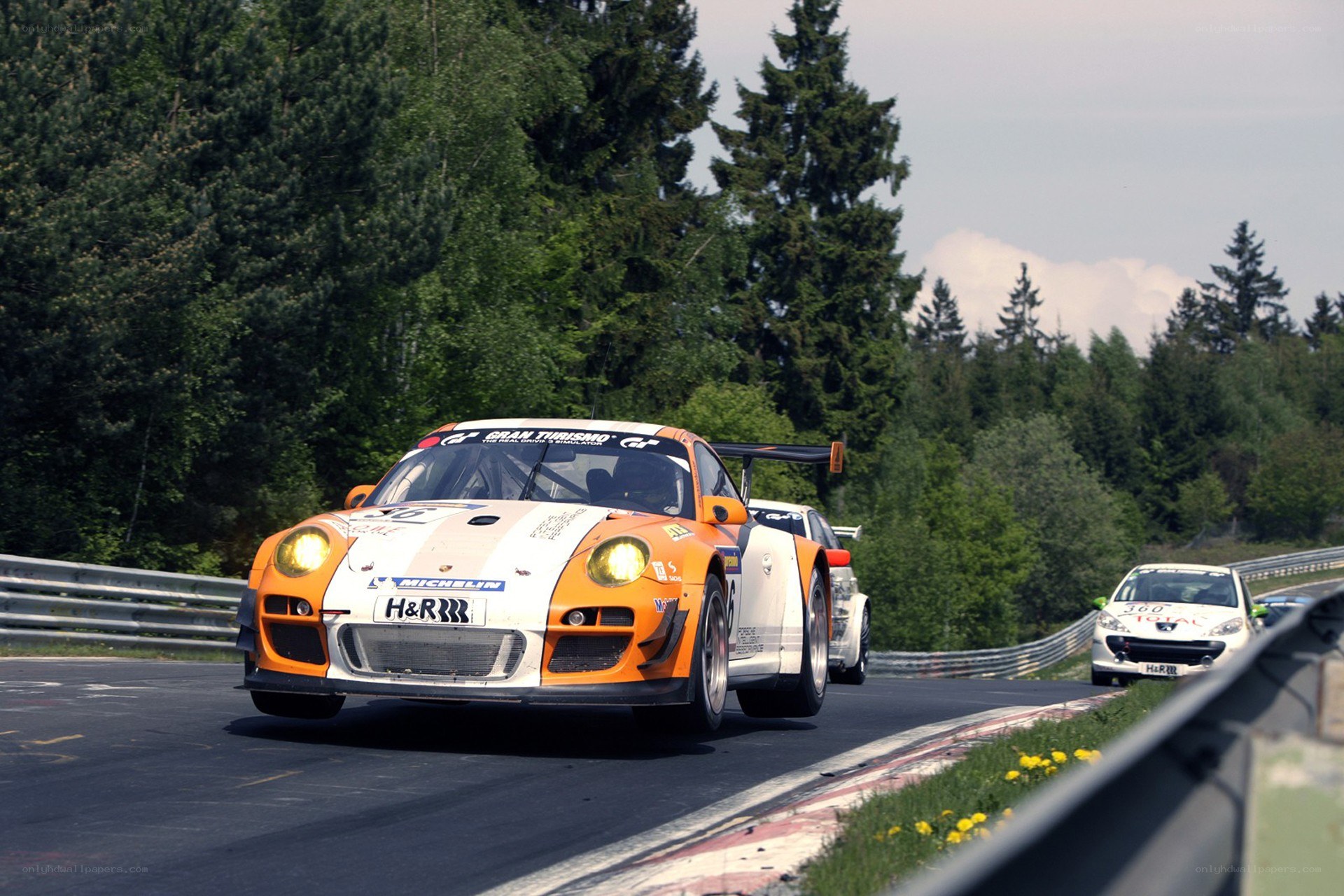 Porsche racing on a track