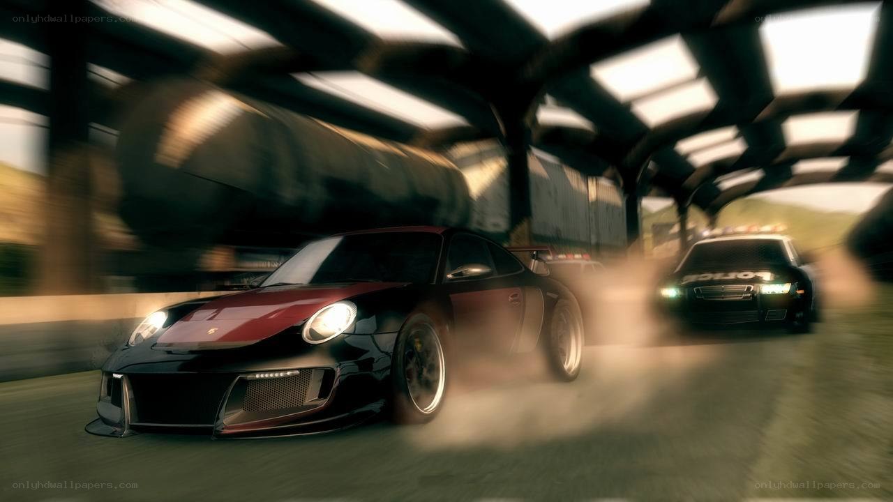 Porsche racing under overpass